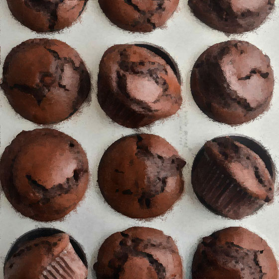 Muffin al cioccolato con coulis di lamponi